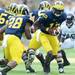 Michigan quarterback Devin Gardner looks to hand off the ball in the first quarter against Northwestern at Michigan Stadium on Saturday. Melanie Maxwell I AnnArbor.com